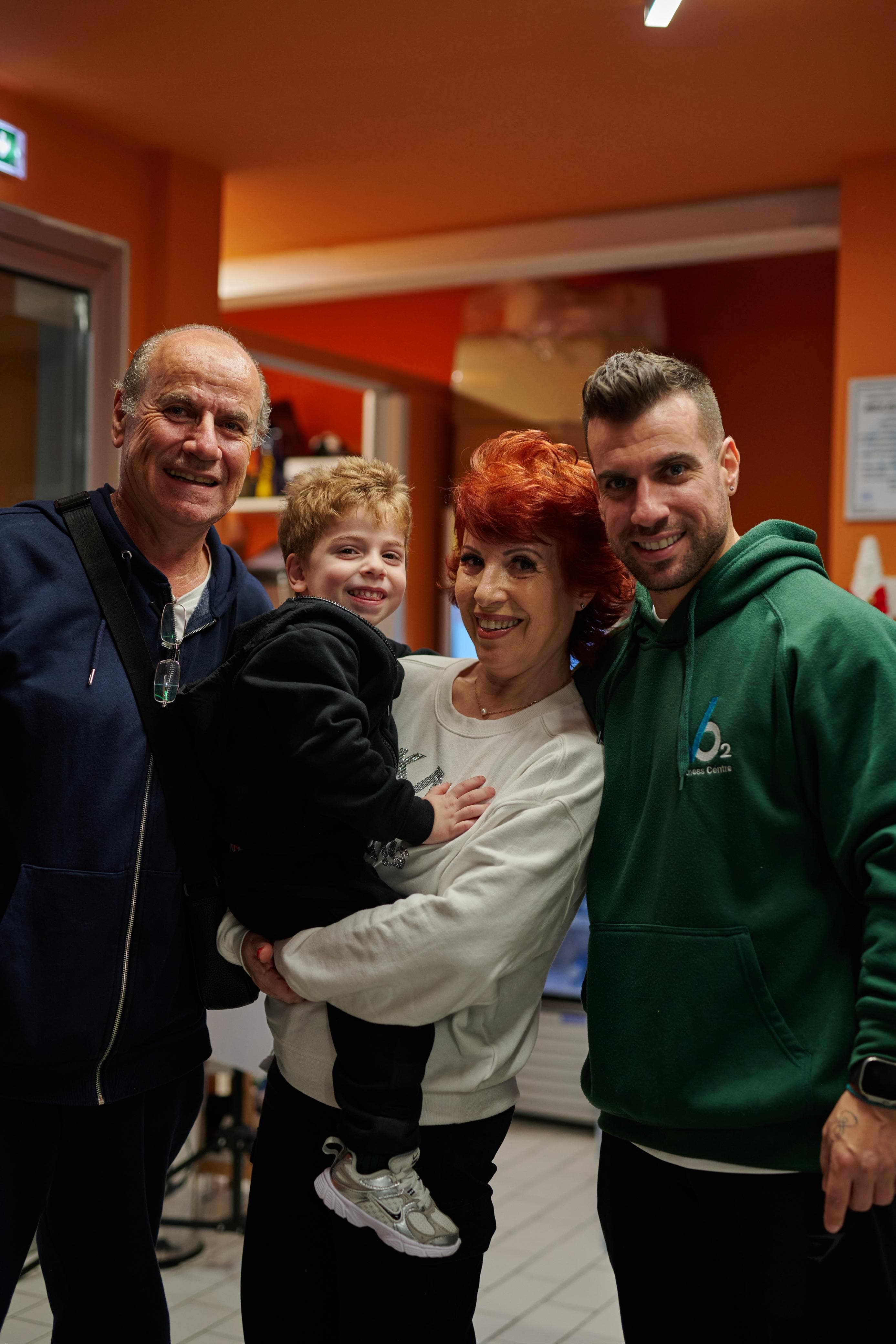 Polymnios with members and family at VO2 Fitness Center reception